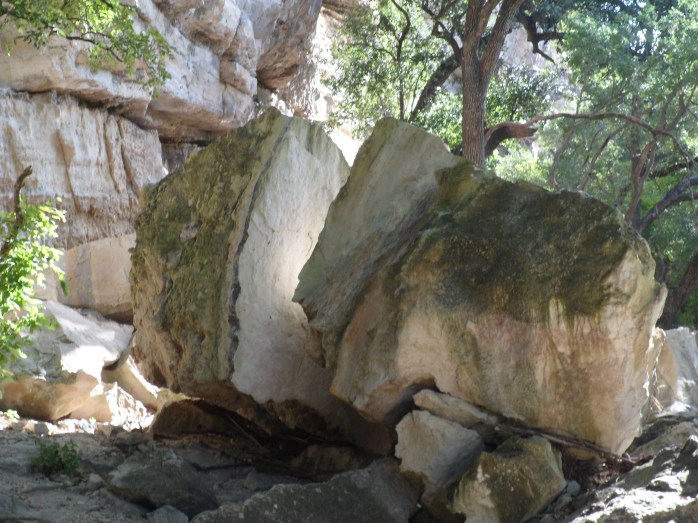 giant split boulder almost on the trail